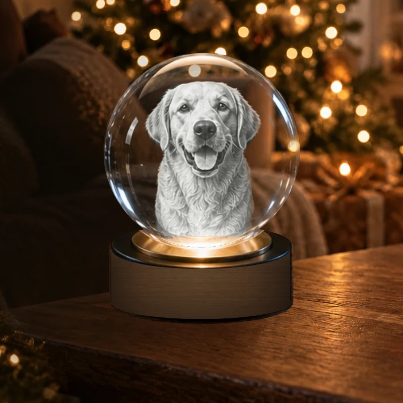 Portrait de chien gravé dans une sphère de cristal sur socle bois lumineux